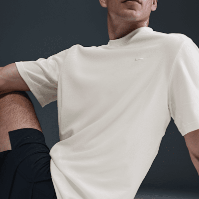 Nike PrimaryVielseitiges Nike Dri-FIT Kurzarm-Oberteil für Herren Sonderangebot