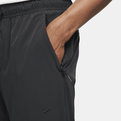 Nike UnlimitedVielseitige Dri-FIT Hose mit Reißverschluss am Bündchen für Herren Kostenloser Versand international